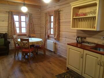 Фото номера Дом с 2 спальнями Дома для отпуска Baublys Lake Lodge г. Viktarinas 11