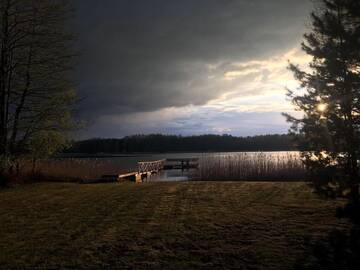 Фото номера Дом с 2 спальнями Дома для отпуска Baublys Lake Lodge г. Viktarinas 9