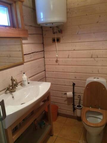 Фото номера Дом с 2 спальнями Дома для отпуска Baublys Lake Lodge г. Viktarinas 32